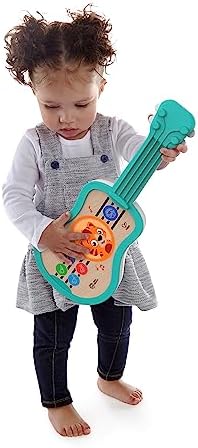 Baby Einstein Sing & Strum Magic Touch Ukulele Wooden Musical Toy, Ages 6 Months+, Multicolored - Image 5